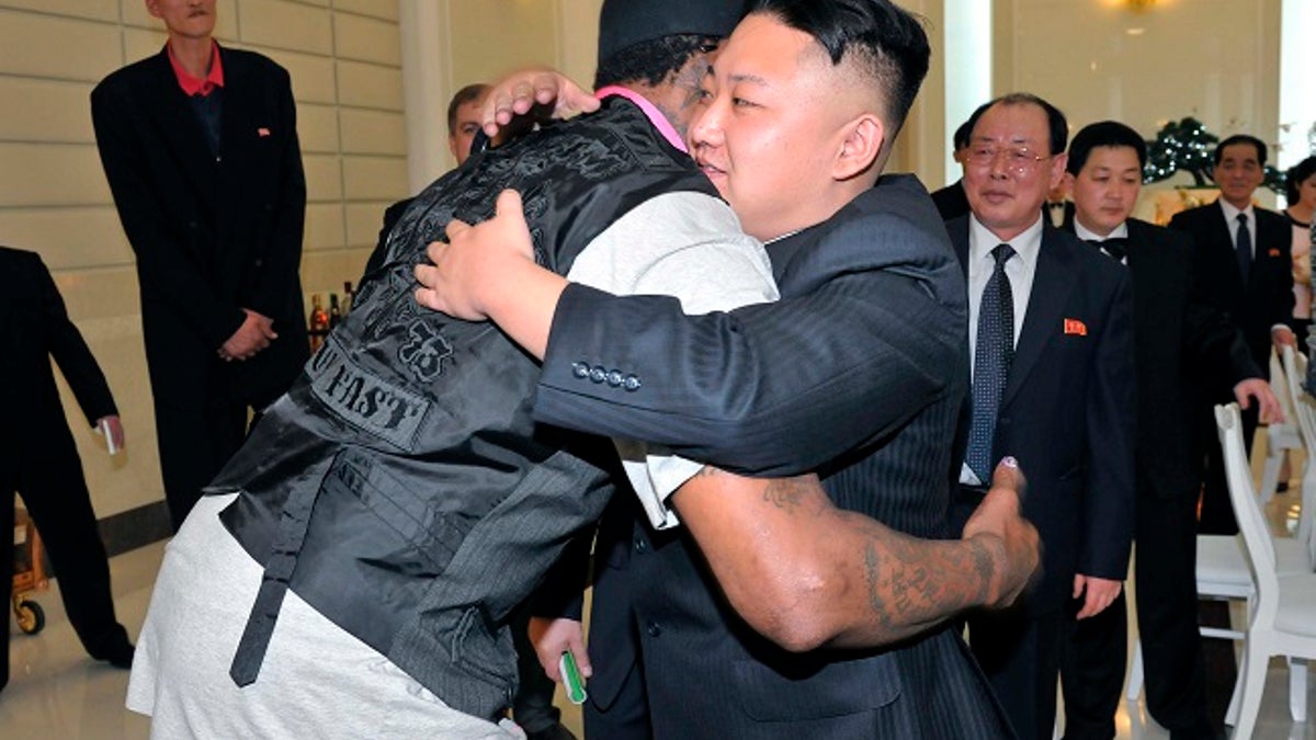 North Korean leader Kim Jong-Un and former NBA basketball player Dennis Rodman (front L) hug in Pyongyang in this undated picture released by North Korea's KCNA news agency on March 1, 2013. KCNA reported that a mixed basketball game of visiting U.S. basketball players and North Korean players was held at Ryugyong Jong Ju Yong Gymnasium on February 28, 2013.     REUTERS/KCNA (NORTH KOREA - Tags: POLITICS SPORT BASKETBALL TPX IMAGES OF THE DAY) ATTENTION EDITORS - THIS PICTURE WAS PROVIDED BY A THIRD PARTY. REUTERS IS UNABLE TO INDEPENDENTLY VERIFY THE AUTHENTICITY, CONTENT, LOCATION OR DATE OF THIS IMAGE. THIS PICTURE IS DISTRIBUTED EXACTLY AS RECEIVED BY REUTERS, AS A SERVICE TO CLIENTS. QUALITY FROM SOURCE. NO THIRD PARTY SALES. NOT FOR USE BY REUTERS THIRD PARTY DISTRIBUTORS - GM1E9310WHR01