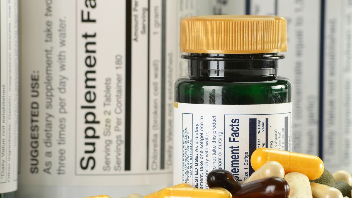 dietary supplements with label istock