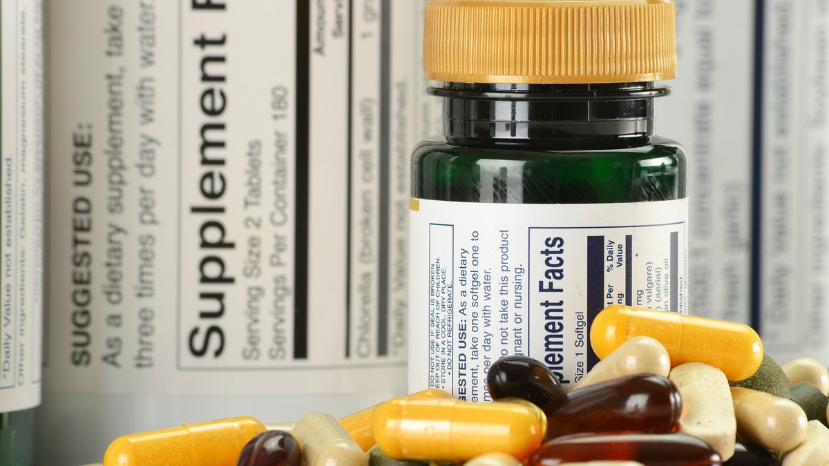 dietary supplements with label istock