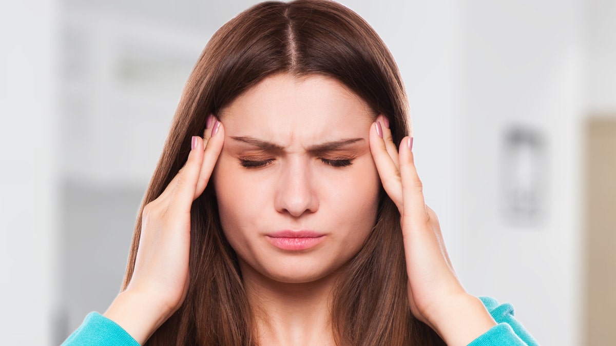 woman with headache, migraine, stress, insomnia, hangover