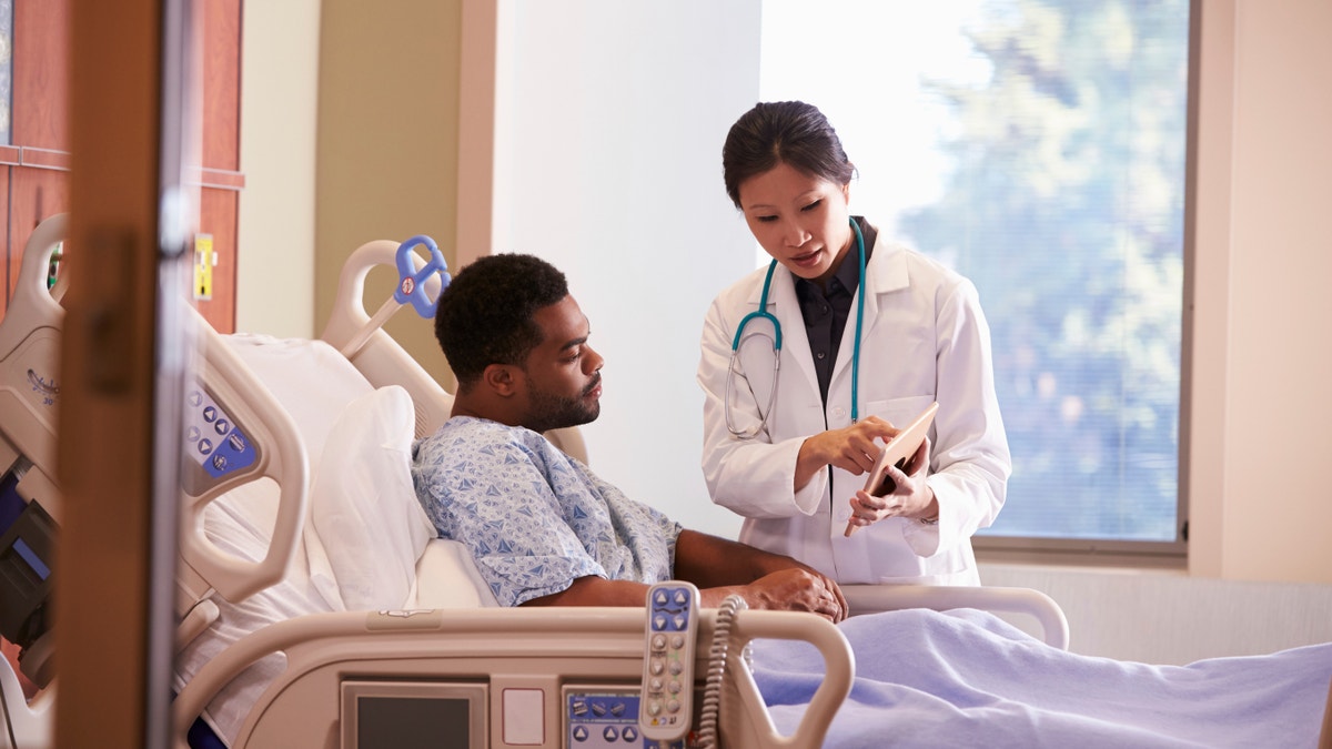doctor talking to a patient istock large