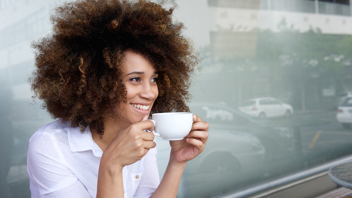 drinking a cup of coffee istock medium