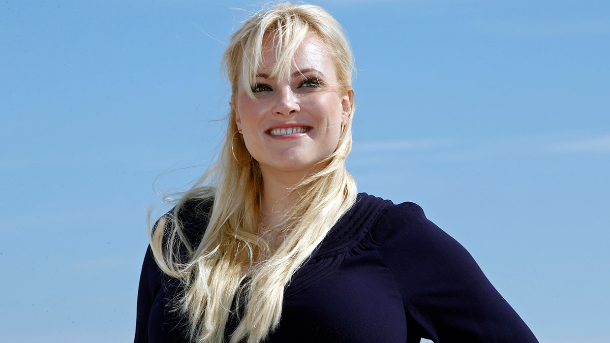 Meghan McCain, daughter of U.S. Senator John McCain and host of "Raising McCain" poses during a photocall during the annual MIPCOM television programme market in Cannes, southeastern France, October 8, 2013. The International film and programme market for TV, video, cable and satellite (MIPCOM) opens from October 7 to October 10 on the French Riviera. REUTERS/Eric Gaillard (FRANCE - Tags: ENTERTAINMENT) - PM1E9A81FRJ01