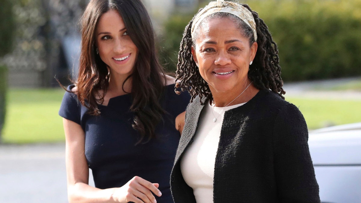 Meghan Markle, left and her mother, Doria Ragland, arrive at Cliveden House Hotel, in Berkshire, England, Friday, May 18, 2018 to spend the night before her wedding to Prince Harry on Saturday. (Steve Parsons/Pool Photo via AP)