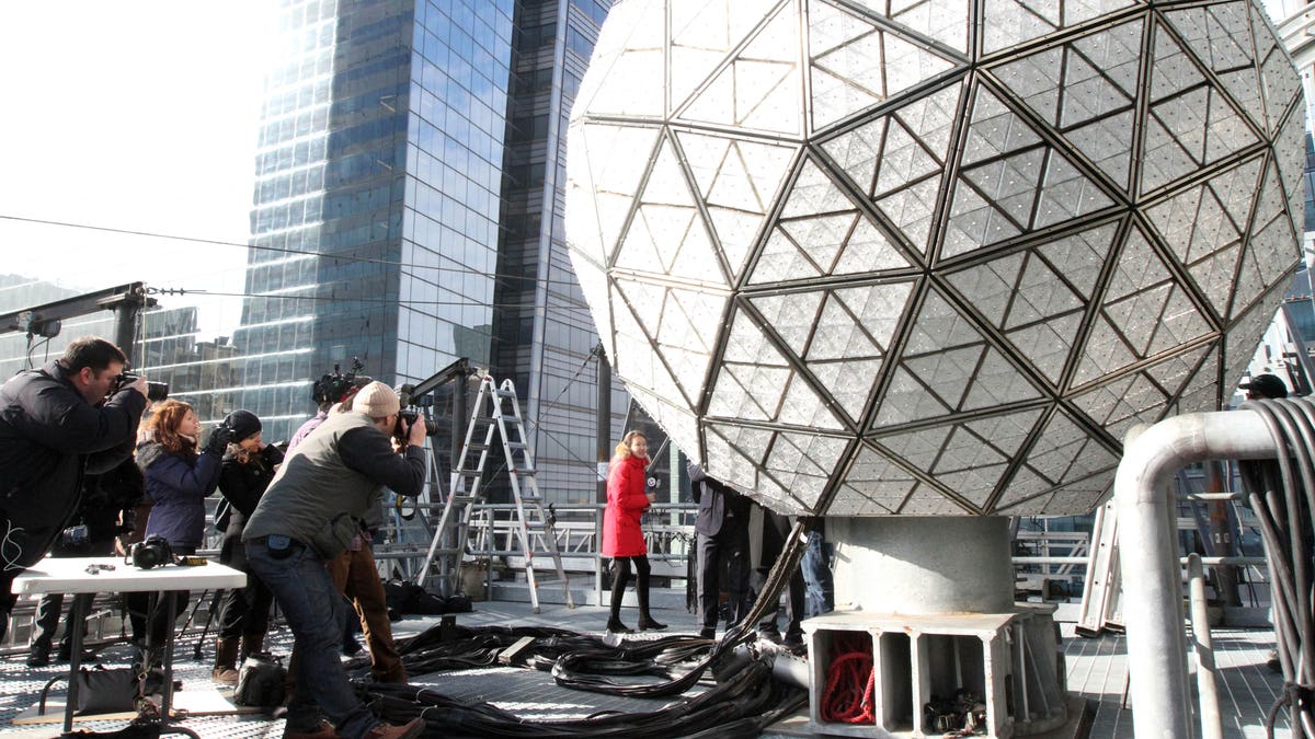 The New Year's Eve Ball is photographed on the roof of One Times Square in New New York during a media event where several of the Waterford Crystal triangles were installed on the ball on Friday Dec. 27, 2013. (AP Photo/Tina Fineberg)