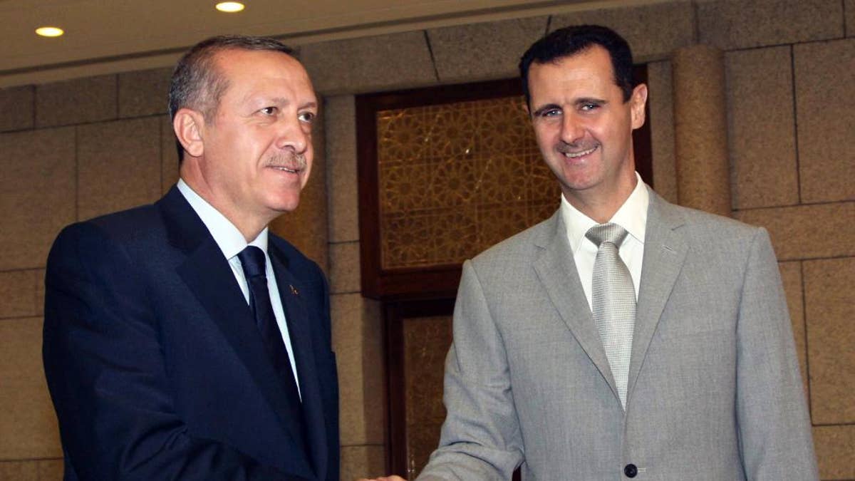 Assad Erdogan handshake