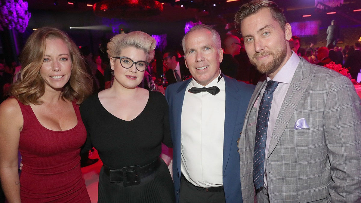 SAN ANTONIO, TX - AUGUST 18:  (L-R) Kendra Wilkinson, Kelly Osbourne, Thomas J. Henry and  Lance Bass attend the Thomas J. Henry Celebrates The 25th Anniversary Of Thomas J. Henry Attorneys at Henry B. Gonzalez Convention Center on August 18, 2018 in San Antonio, Texas. (Photo by Johnny Nunez/Getty Images for Thomas J. Henry Attorneys )