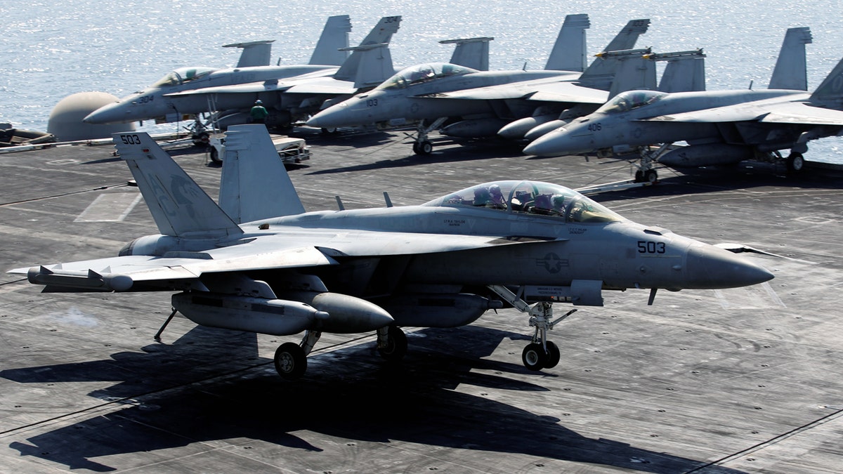 An EA-18G Growler lands after returning from Mosul, Iraq to provide air-support from the USS Dwight D. Eisenhower CVN 69 carrier in Arabia Gulf, October 19, 2016. REUTERS/Hamad I Mohammed - S1BEUHWWXBAB