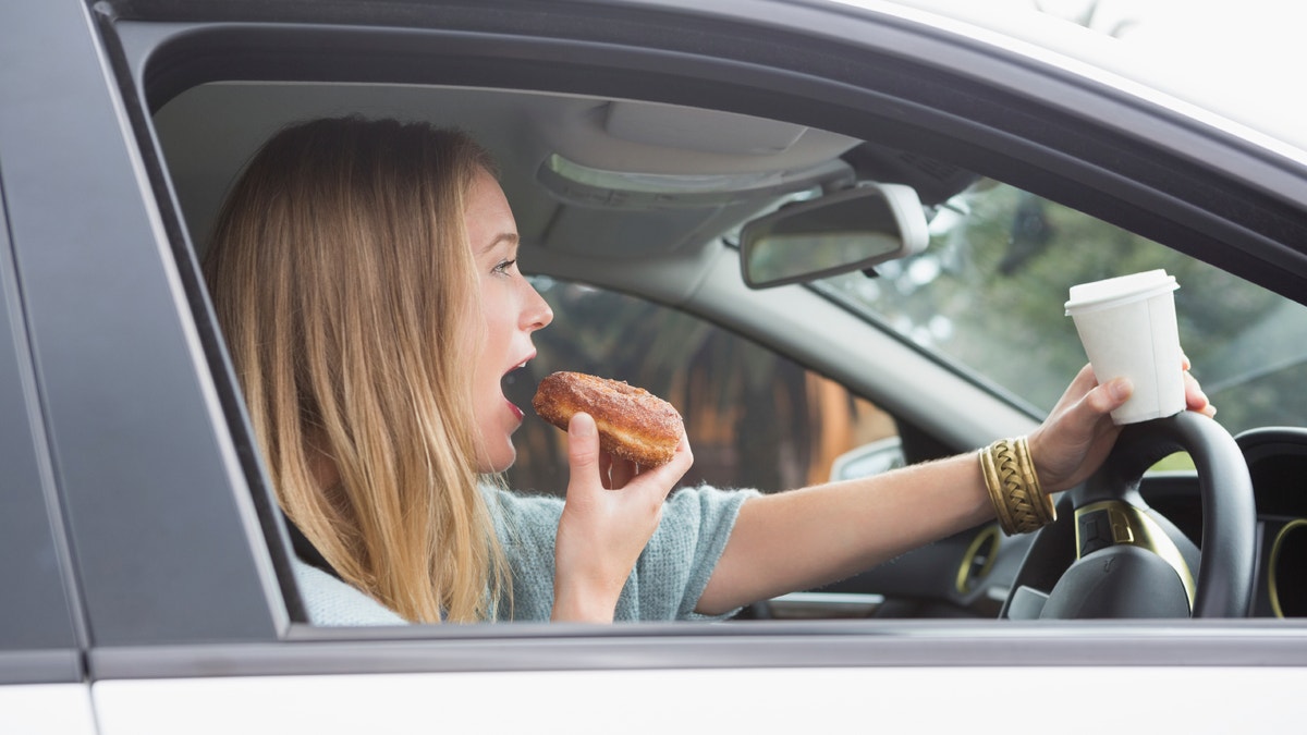 eating a donut istock