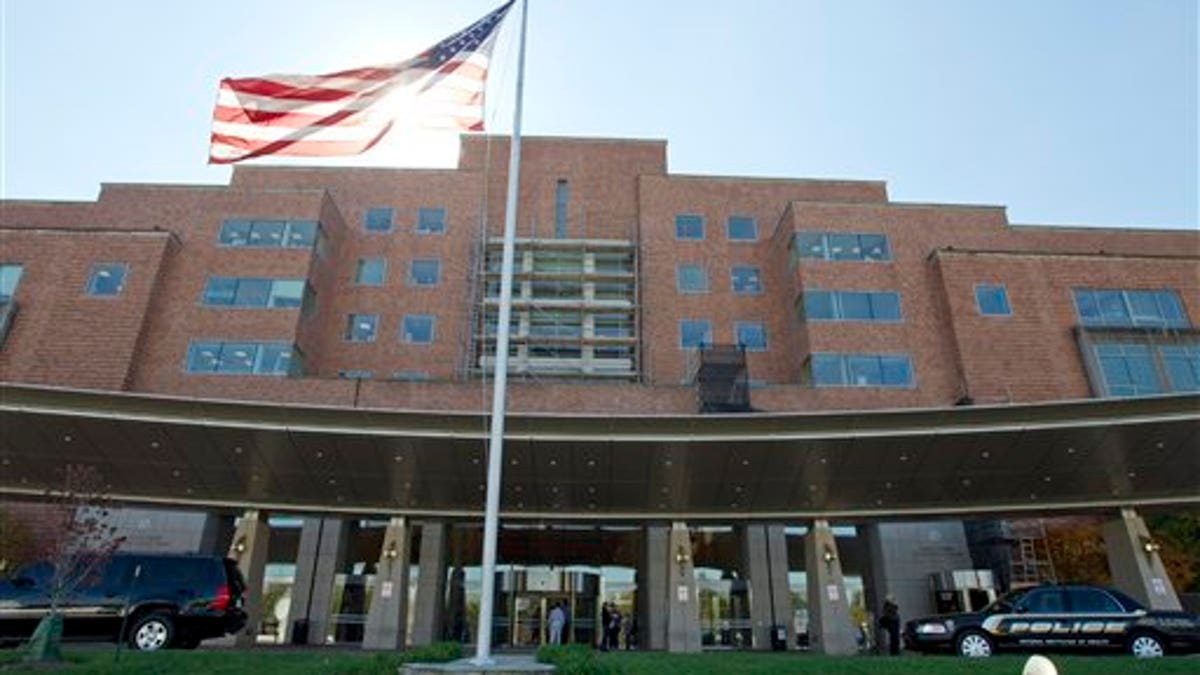 FILE - In this Oct. 17, 2014 file photo, The National Institutes of Health Mark O. Hatfield Clinical Research Center where patients with Ebola are treated is seen in Bethesda, Md. (AP Photo/Jose Luis Magana, File)