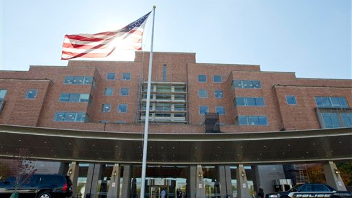 FILE - In this Oct. 17, 2014 file photo, The National Institutes of Health Mark O. Hatfield Clinical Research Center where patients with Ebola are treated is seen in Bethesda, Md. (AP Photo/Jose Luis Magana, File)
