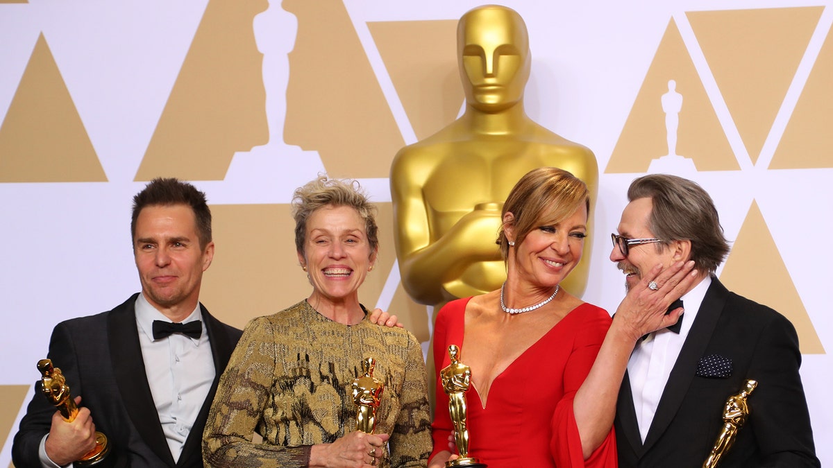 90th Academy Awards - Oscars Backstage - Hollywood, California, U.S., 04/03/2018 - Oscar winners Sam Rockwell, Frances McDormand, Allison Janney and Gary Oldman (L to R) pose backstage. REUTERS/Mike Blake - HP1EE350F1OFS