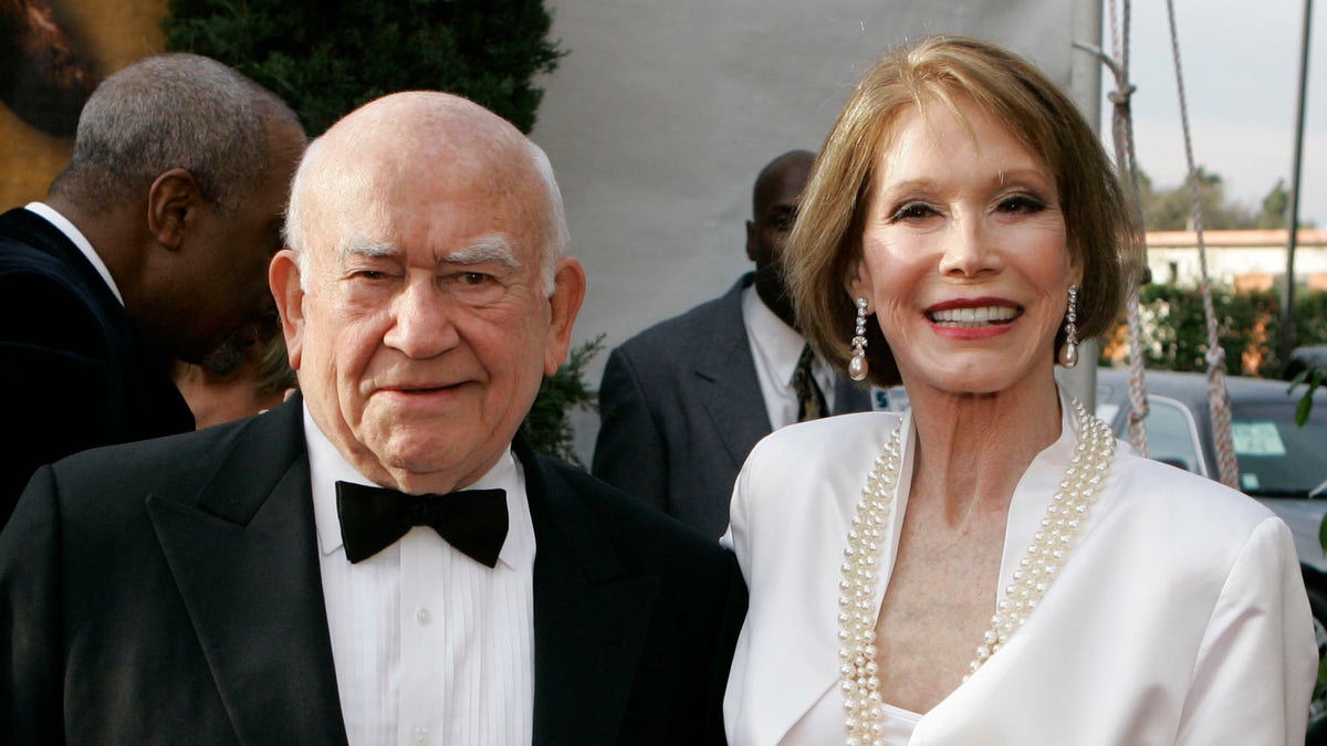 Ed Asner, left, and Mary Tyler Moore, from television's 