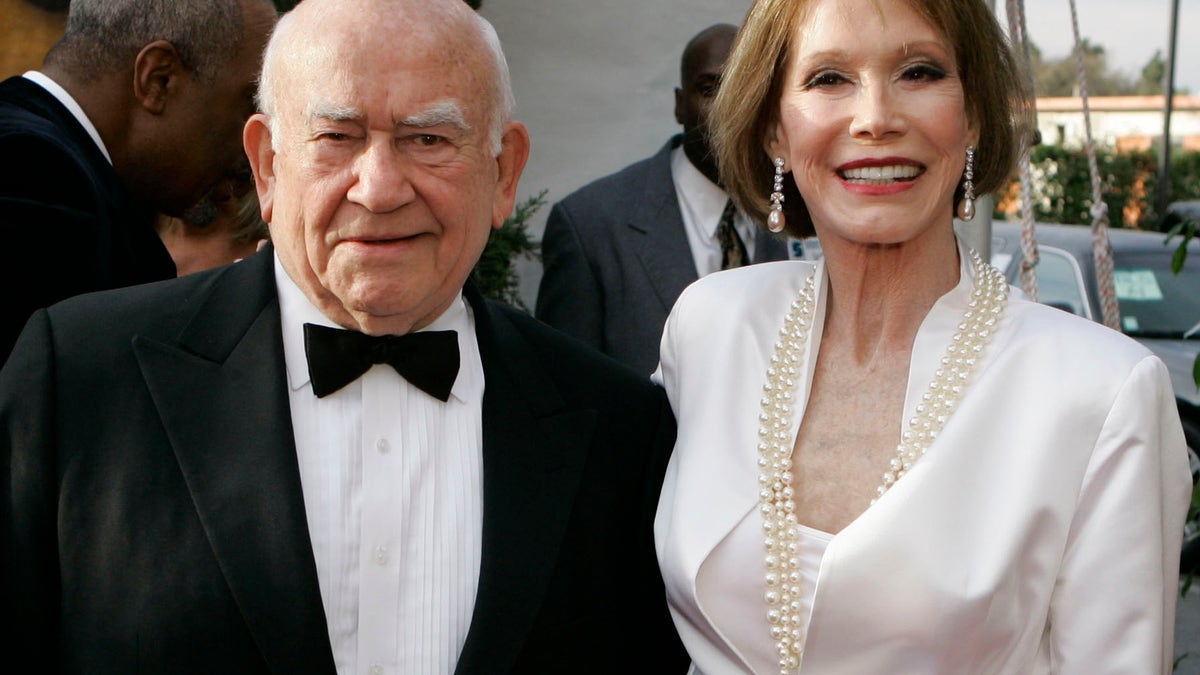 Ed Asner, left, and Mary Tyler Moore, from television's 