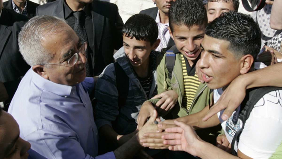 eda9fe8b-Mideast Israel Palestinians