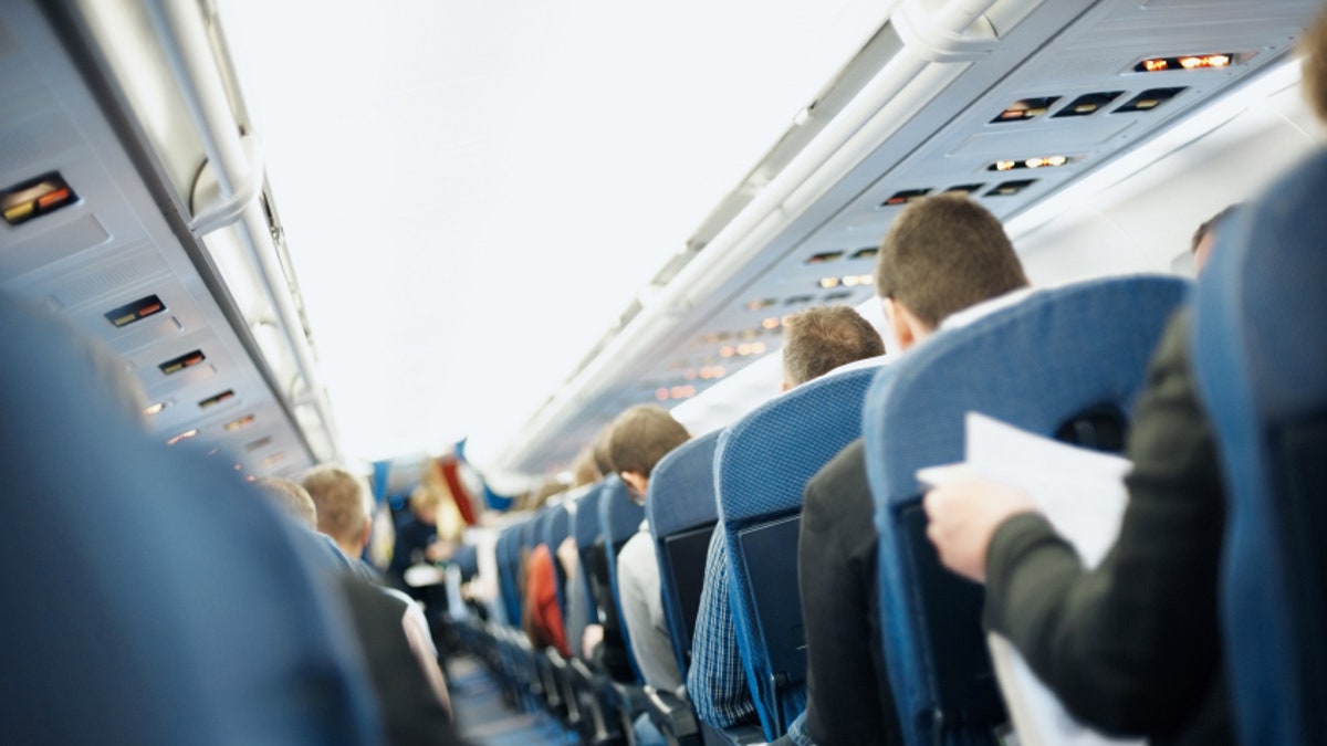 Rows of seats in airplane