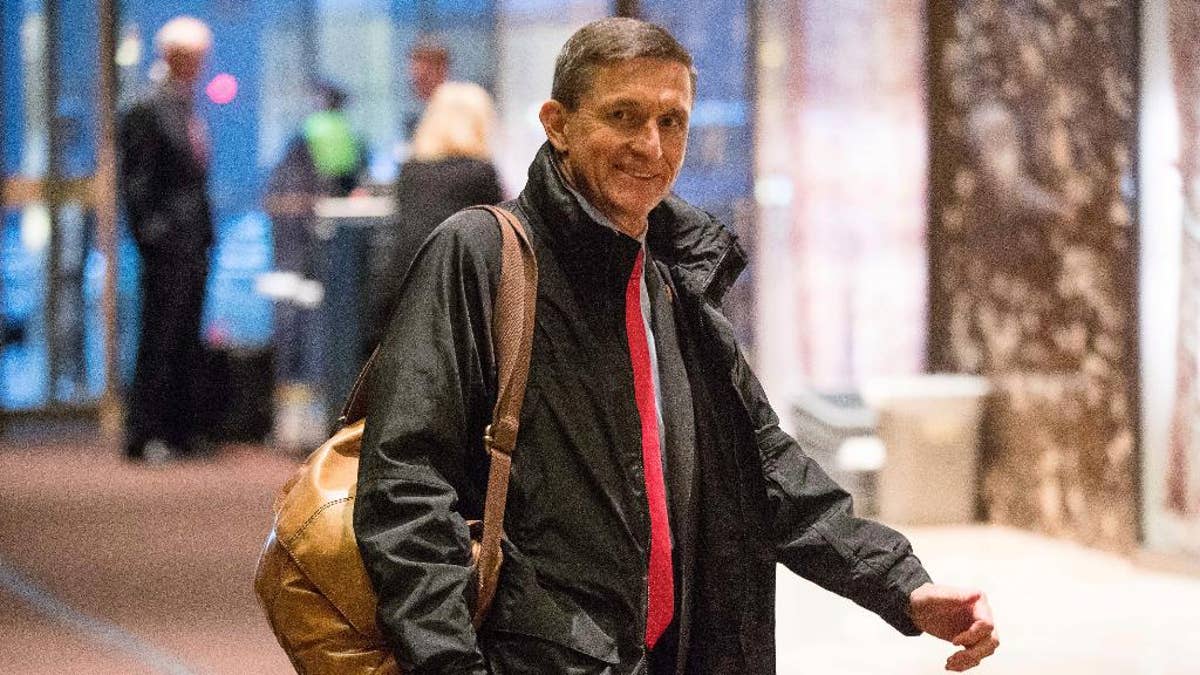 FILE - In this Jan. 3, 2017 file photo, National Security Adviser-designate Michael Flynn arrives at Trump Tower in New York. Some of President-elect Donald Trump’s most important Cabinet choices are at odds with him on matters that were dear to his heart as a campaigner and central to his promises to supporters. For the Pentagon, the CIA, the State Department and more, Trump has picked people who publicly disagree with him on some cornerstones of his agenda In confirmation hearings.(AP Photo/Andrew Harnik, File)