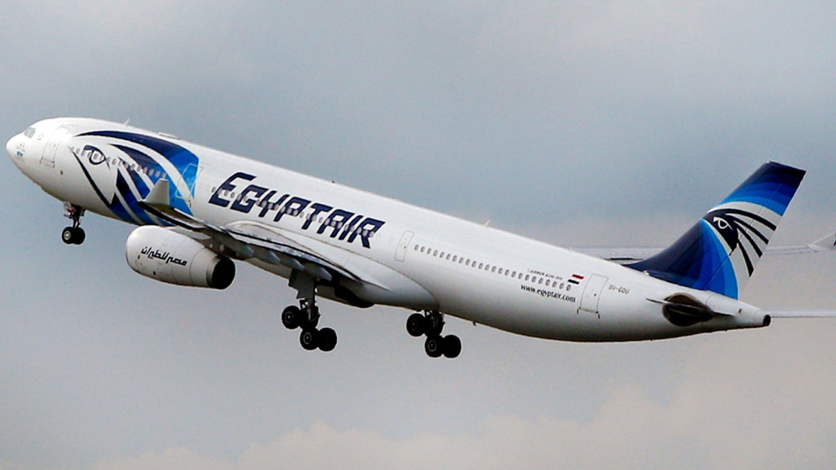 FILE - In this May 19, 2016 file photo, an EgyptAir Airbus A330-300 takes off for Cairo from Charles de Gaulle Airport outside of Paris. Egyptian investigators said Saturday, July 2, 2016, that they will be able to access the cockpit voice recordings of the EgyptAir flight that crashed in May despite damage to the black box. The flight from Paris to Cairo crashed into the Mediterranean on May 19, killing all 66 people on board. The pilots made no distress call, and no militant group has claimed to have brought the aircraft down. (AP Photo/Christophe Ena, File)