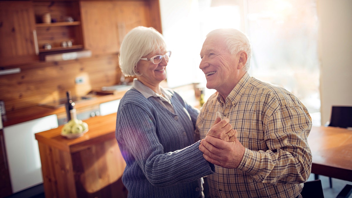 Close up of a senior couple dancing