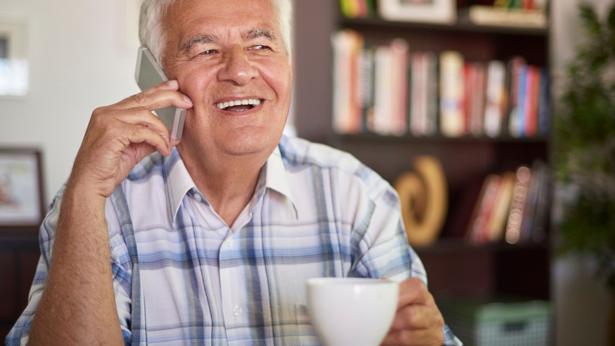 elderly man on the phone istock large