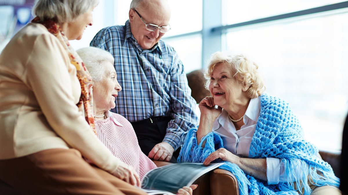 elderly people talking nursing home istock large