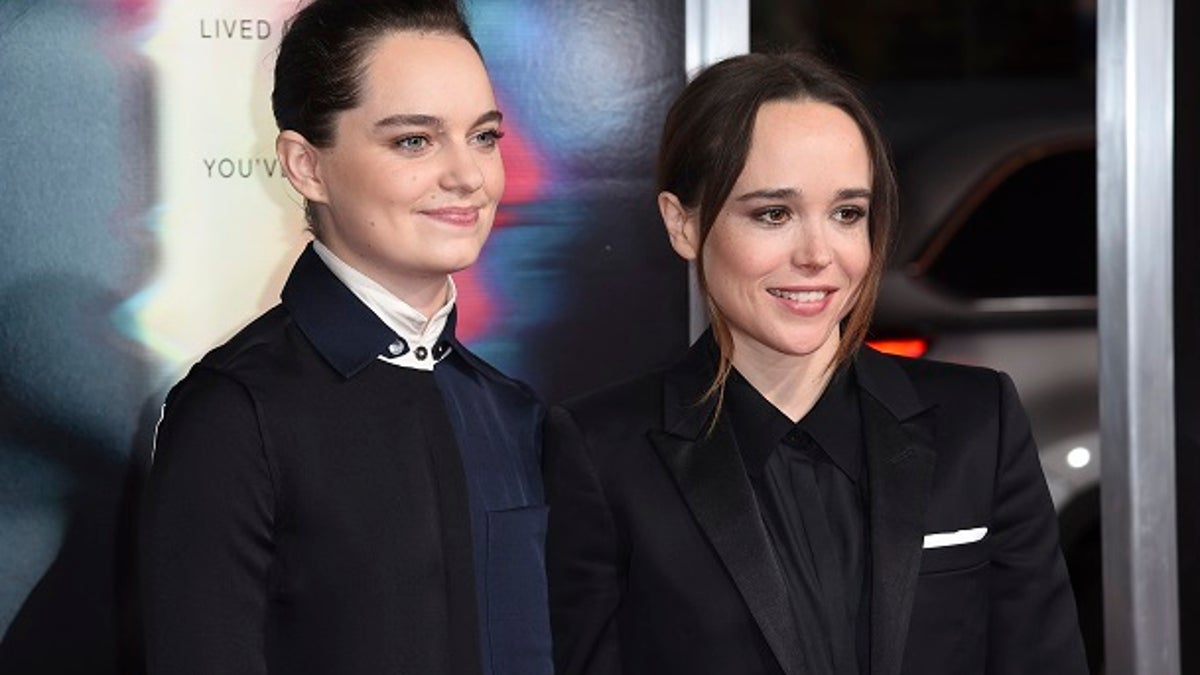 FILE - In this Sept. 27, 2017 file photo, Emma Portner, left, and Ellen Page arrive at the world premiere of 