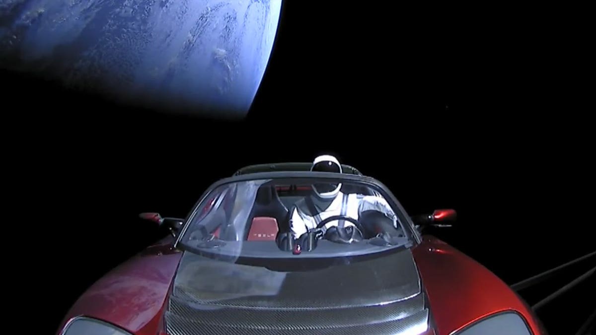 Starman and his Tesla leave Earth behind shortly after launching atop SpaceX's Falcon Heavy rocket on Feb. 6, 2018.