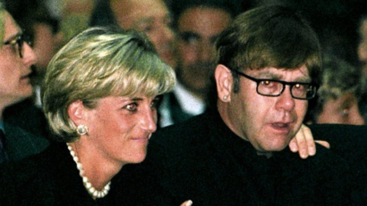 FILE PHOTO 22JUL97 - Diana, Princess of Wales and pop star Elton John attend a memorial mass for Italian fashion designer Gianni Versace in Milan Cathedral July 22. Rock superstar Elton John will sing at her funeral on Saturday before a worldwide television audience expected to run into hundreds of millions. Elton John said in a television interview that he will do all he can not to cry when he performs at the funeral of his friend Diana.

DIANA ELTON - RP1DRIDVROAB