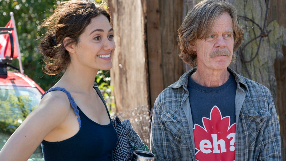 Emmy Rossum as Fiona Gallagher and William H. Macy as Frank Gallagher in 