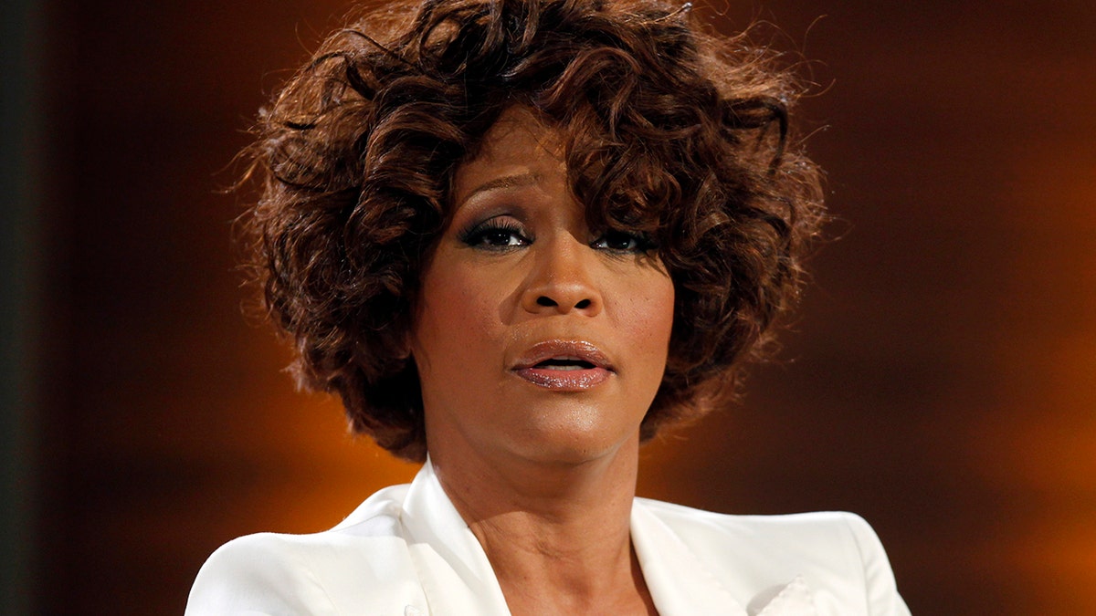Singer Whitney Houston looks on on the German TV game show 
