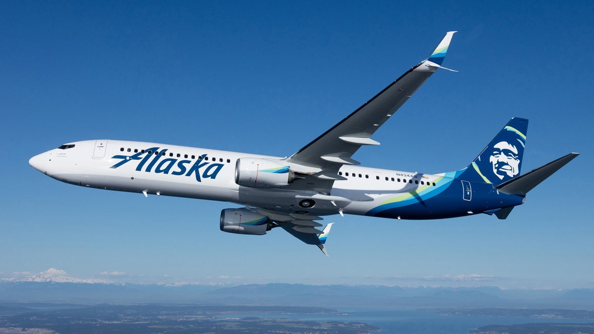 Alaska Airlines flight diverts after belligerent passenger lit a