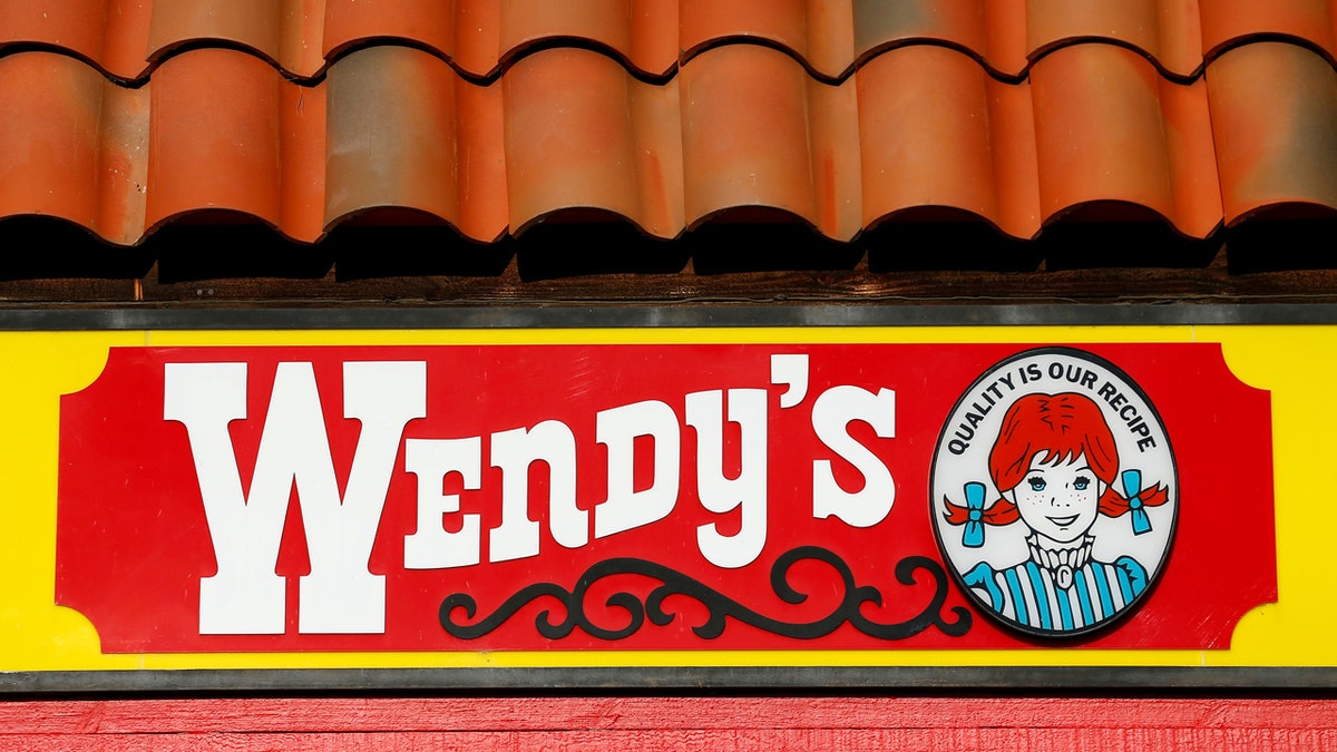 A Wendy's sign and logo are shown at one of the company's restaurant in Encinitas, California May 10, 2016 .  REUTERS/Mike Blake/File Photo              GLOBAL BUSINESS WEEK AHEAD PACKAGE - SEARCH 'BUSINESS WEEK AHEAD NOV 7'  FOR ALL IMAGES - RTX2S8G7