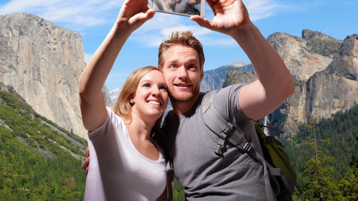 happy couple selfie in yosemite