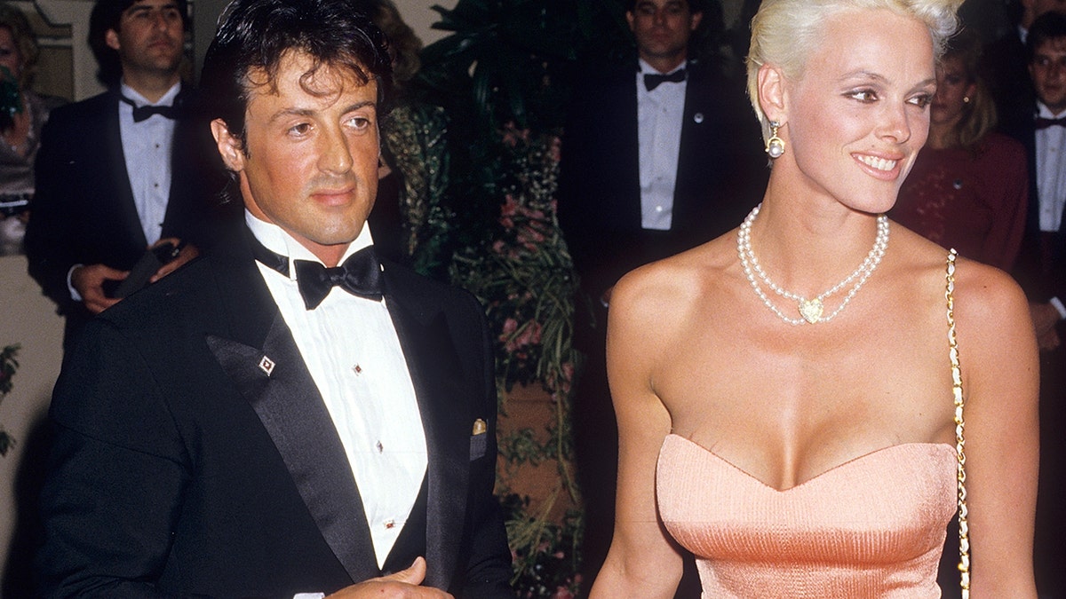 Sylvester Stallone and Brigitte Nielsen attend the 15th Annual American Film Institute (AFI) Lifetime Achievement Award Salute to Barbara Stanwyck on April 9, 1987 at the Beverly Hilton Hotel in Beverly Hills, California.