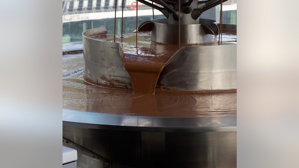 Pouring chocolate in a chocolate factory