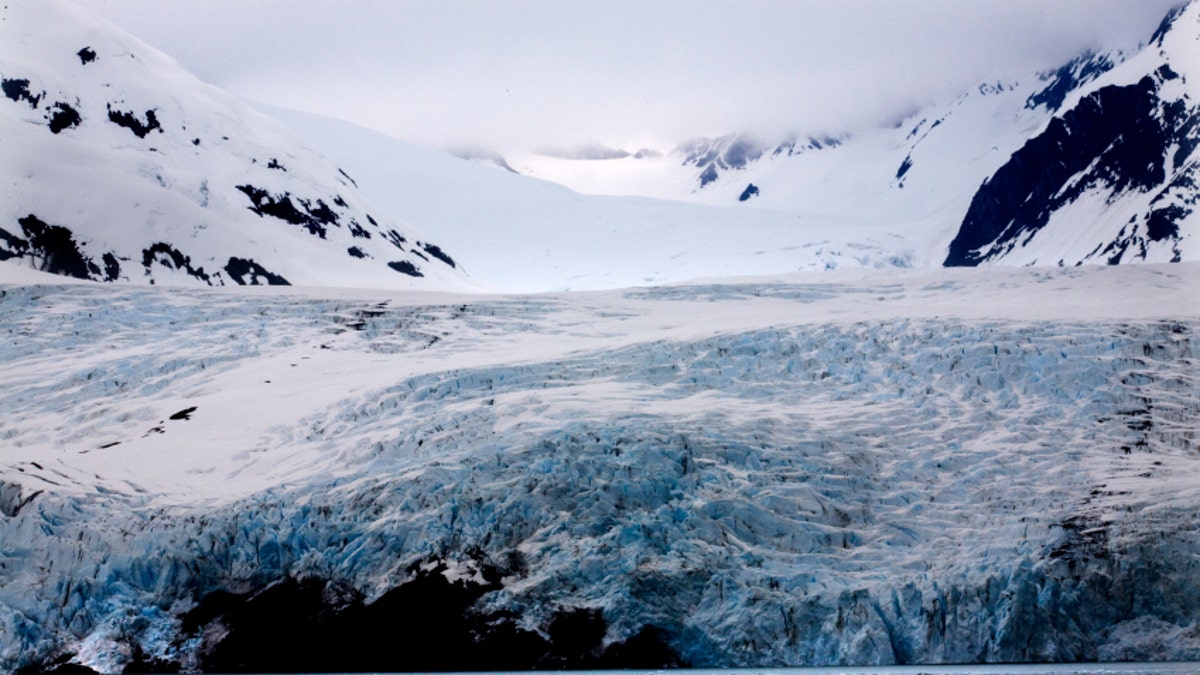 Blue Icy Portage Glacier and Mountain Alaska