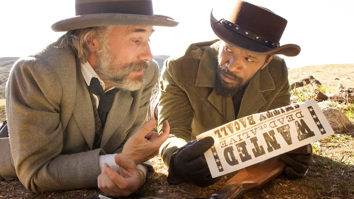 This undated publicity image released by The Weinstein Company shows, Christoph Waltz as Schultz, left, and Jamie Foxx as Django in the film, 