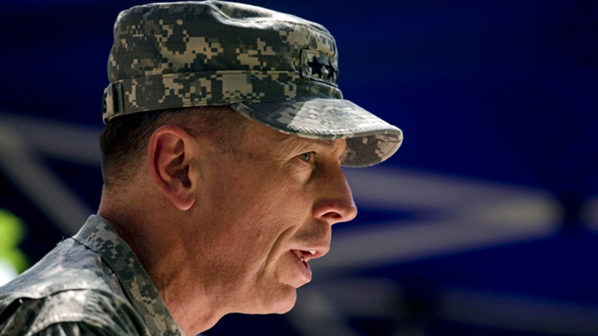 Gen. David Petraeus, the new commander of U.S. and NATO forces in Afghanistan, speaks during a ceremony in which he formally assumed the command, Sunday, July 4, 2010 in Kabul, Afghanistan. (AP Photo/Dusan Vranic)