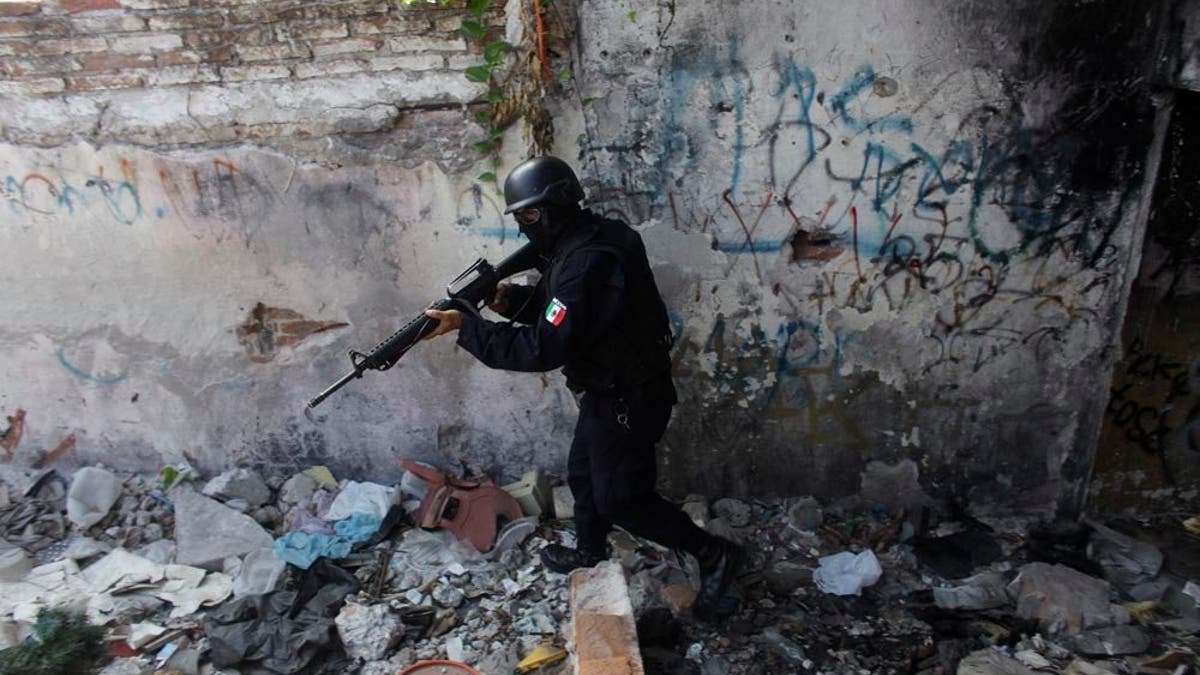 Armed state police officer in Mexico