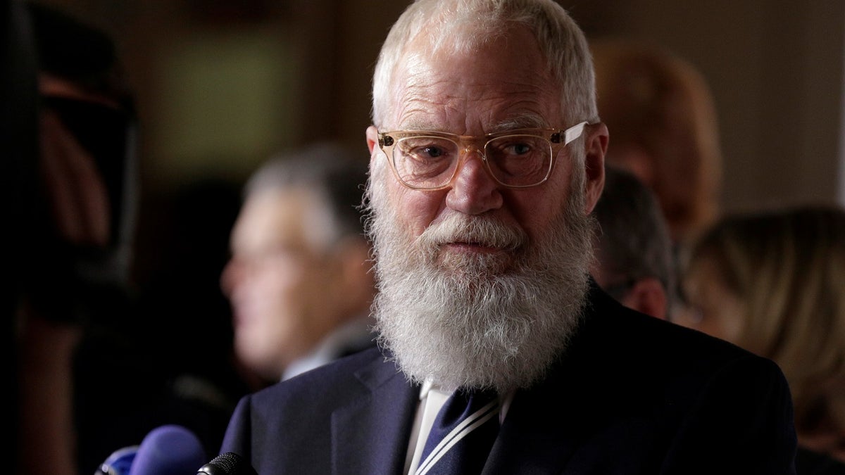 Comedian David Letterman speaks to the media as he arrives for a gala where he is receiving the Mark Twain Prize for American Humor at Kennedy Center in Washington, U.S., October 22, 2017. REUTERS/Joshua Roberts - RC1872DC7C10