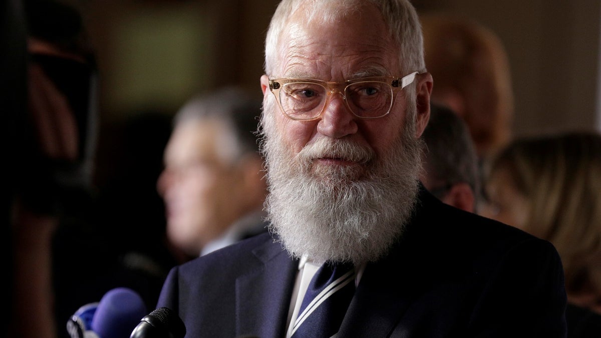 Comedian David Letterman speaks to the media as he arrives for a gala where he is receiving the Mark Twain Prize for American Humor at Kennedy Center in Washington, U.S., October 22, 2017.   REUTERS/Joshua Roberts - RC1872DC7C10