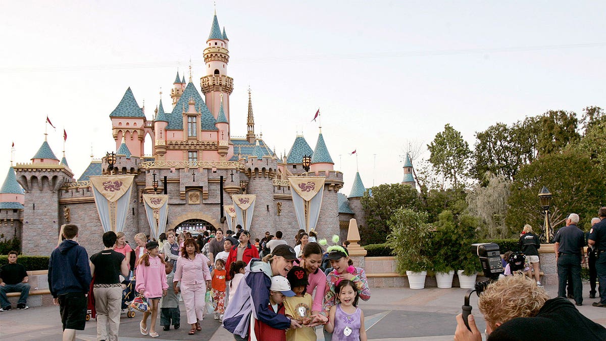 family at disneyland