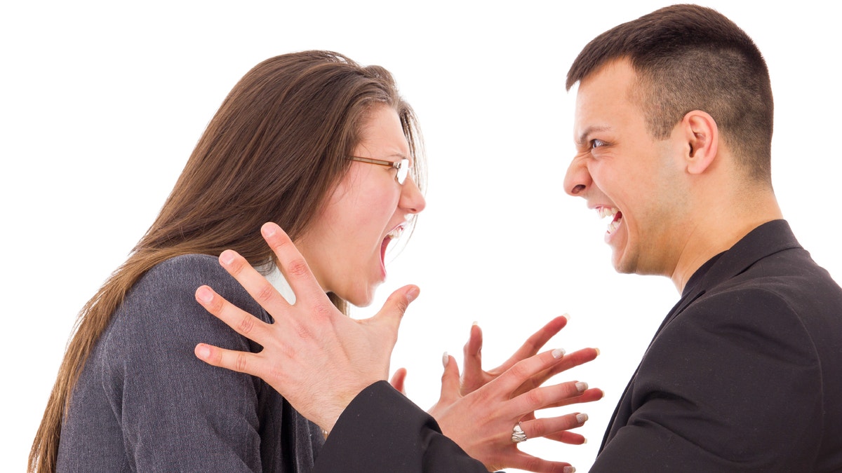 angry couple fighting wanting to strange each other