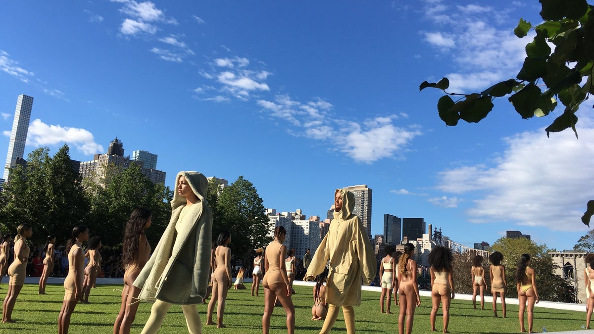 Models wear the Yeezy Season 4 collection by Kanye West during a fashion show, Wednesday, Sept. 7, 2016, at the Franklin D. Roosevelt Four Freedoms Park on Roosevelt Island in New York. The show, set to an eery soundtrack, helped kick off New York Fashion Week. (AP Photo/Leanne Italie)