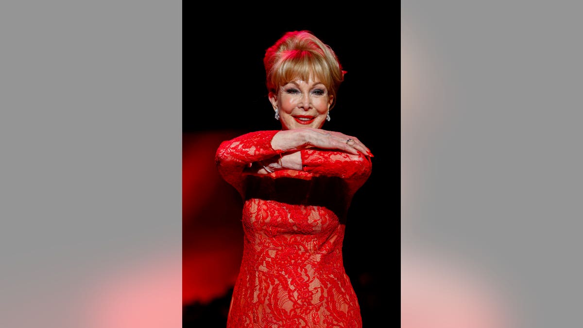 Actress Barbara Eden walks in a Carmen Marc Valvo creation during a presentation of the Go Red for Women Red Dress collection during New York Fashion Week February 12, 2015. REUTERS/Lucas Jackson (UNITED STATES - Tags: FASHION SOCIETY ENTERTAINMENT) - RTR4PEEL