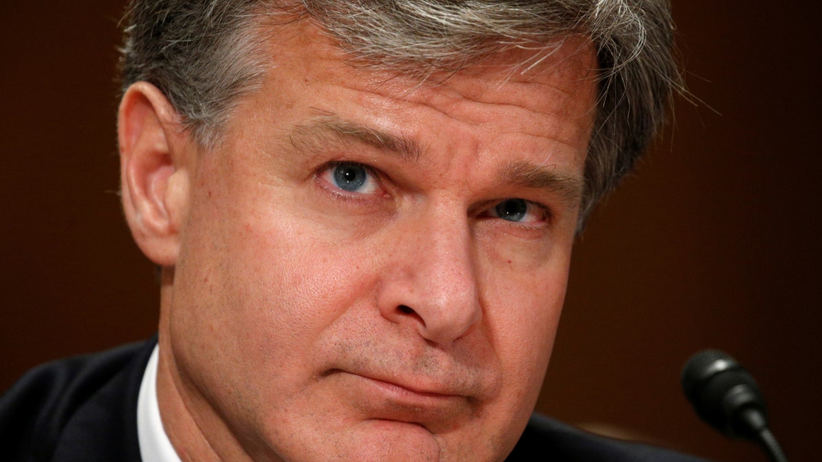 FBI Director Christopher Wray testifies before a Senate Homeland Security and Governmental Affairs hearing on 
