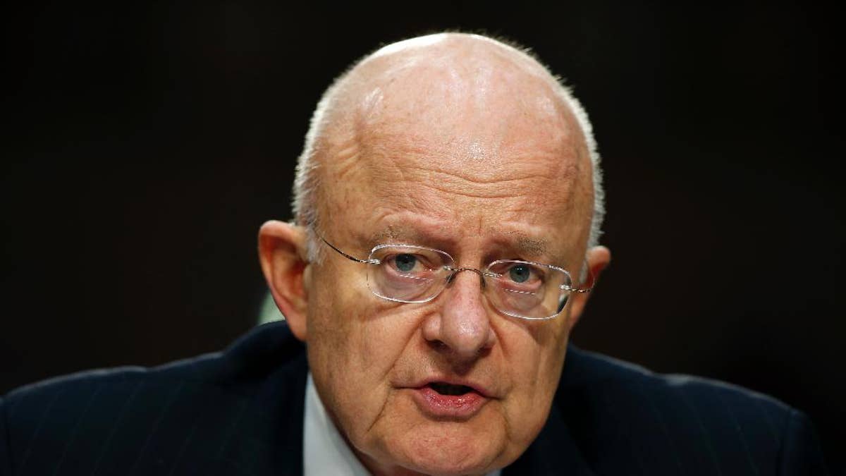 FILE - In this Feb. 9, 2016 file photo, Director of the National Intelligence James Clapper testifies on Capitol Hill in Washington. Even though bulk collection of Americans’ phone records has ended, calls and emails are still being swept up by U.S. surveillance work targeting foreigners. There is a renewed push to find out how many. (AP Photo/Alex Brandon, File)