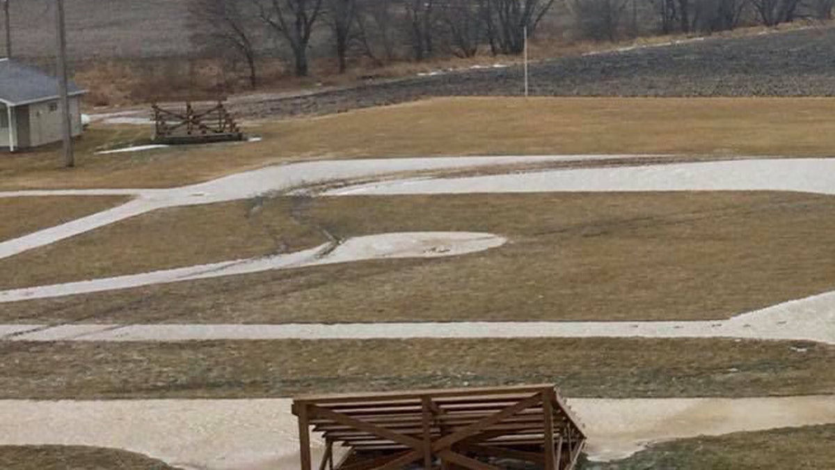 Damage to the "Field of Dreams" movie site in Dyersville, Iowa, is visible after a vandal drove onto the field.