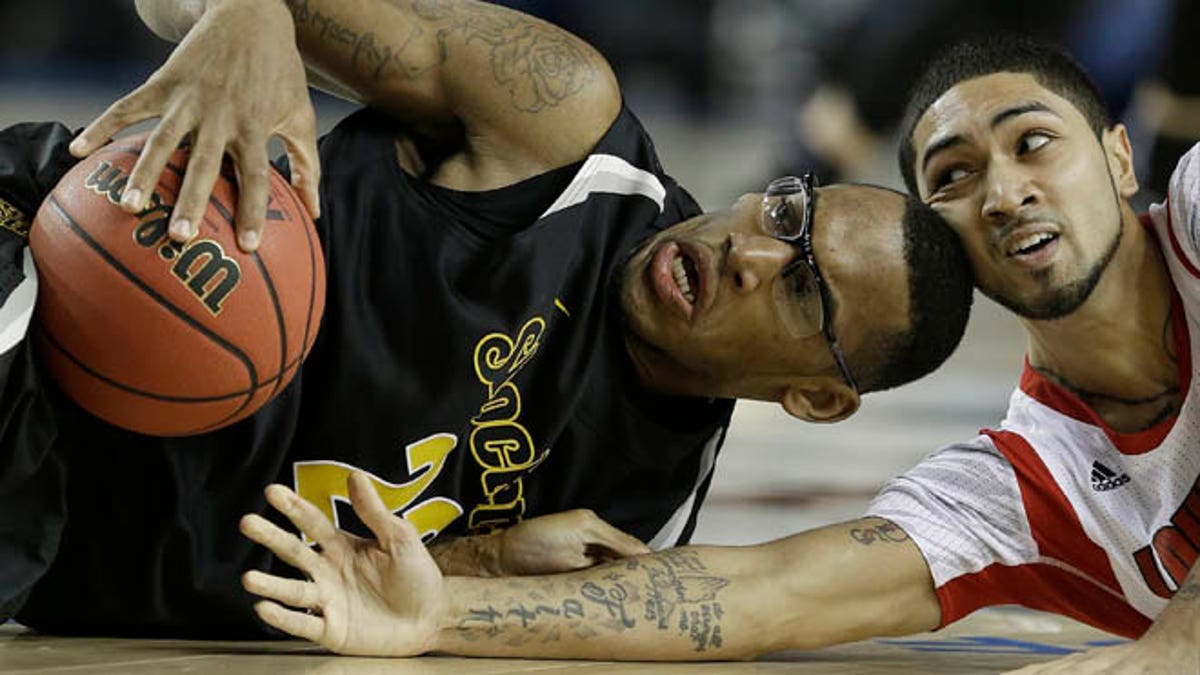 Louisville rallies late to defeat Wichita State in Final Four, Sports