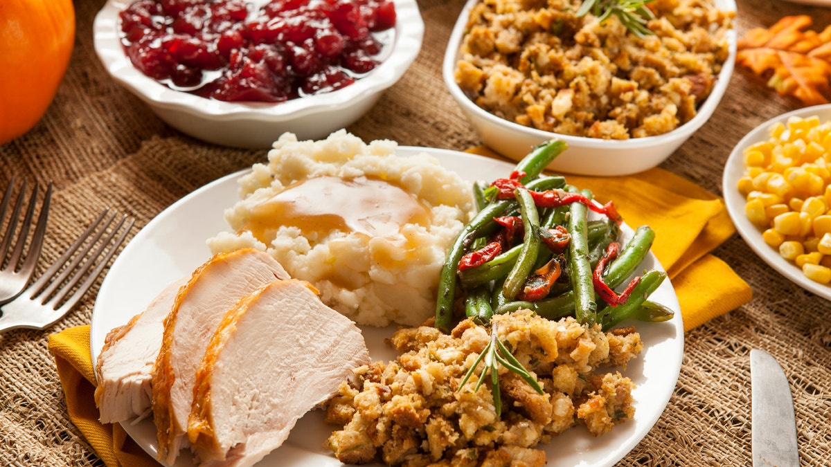 Homemade Turkey Thanksgiving Dinner with Mashed Potatoes, Stuffing, and Corn